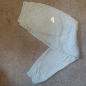 Nike grey joggers.